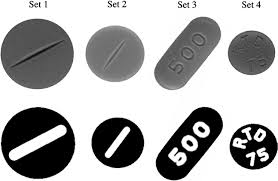 Image processing for visual inspection of imprinted pharmaceutical tablets 